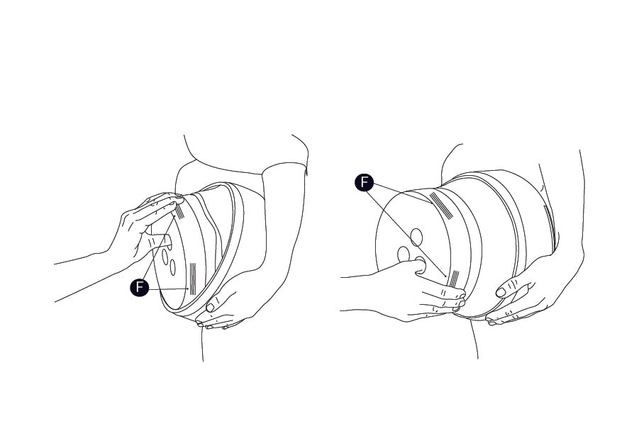 Step 1: Slide safety lock closed. Hug pail close to body with one arm. Place thumb in hole and fingers on textured grip (F) on bottom side of pail. Pull bottom away from top on an angle in a downward direction to expand  middle of pail. Rotate pail and repeat to fully open.